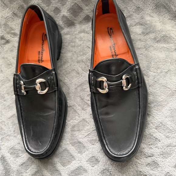 Salvatore Ferragamo Black Leather Slip-Ons with Silver Buckles